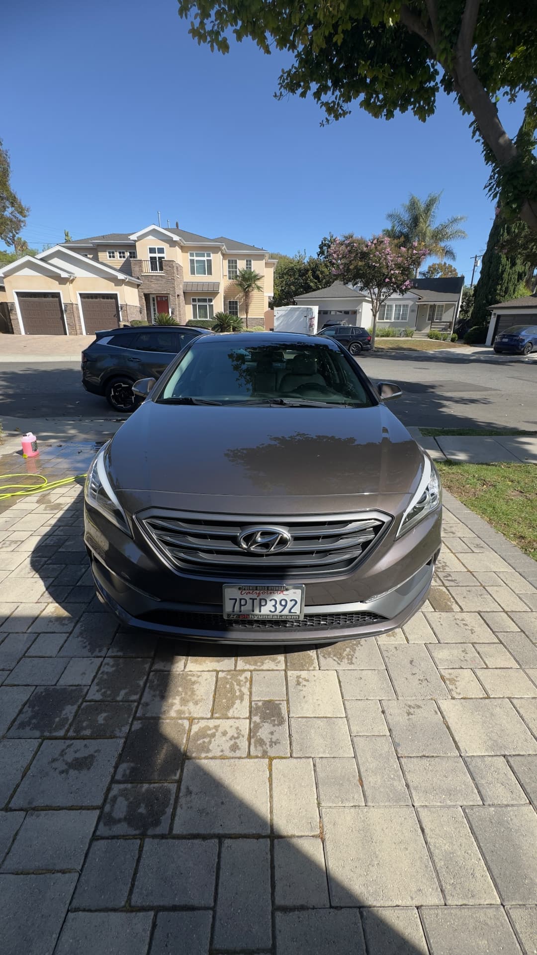 Silver Hyundai sedan after a wash and hand dry